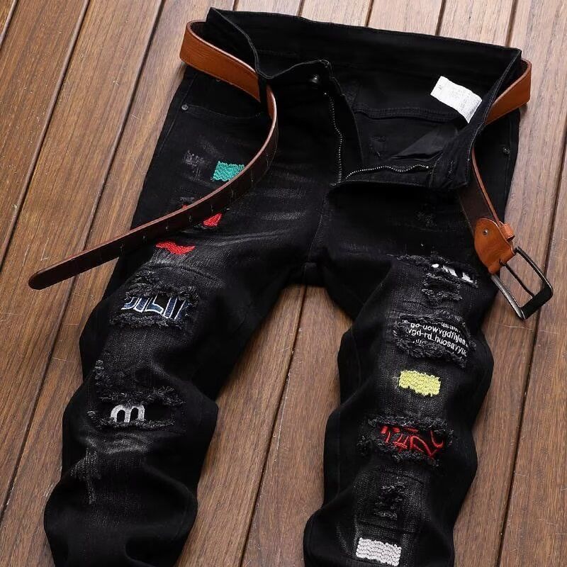 Streetwear Brand Designs - กางเกงยีนส์ขาดสไตล์สตรีทแฟชั่นเกาหลี ทรงสลิมพิมพ์ลายลำลอง ยืดหยุ่น สีดำ กางเกงยีนส์ผู้ชายแบรนด์ดีไซเนอร์
